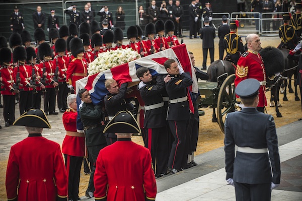 The Ceremonial Funeral Of Former British Prime Minister Baroness Thatcher - LONDON, ENGLAND - APRIL 17:  In this handout image provided by MoD Crown Copyright, Members of the Armed Services carry the coffin up the steps during the Ceremonial funeral of former British Prime Minister Baroness Thatcher at St Paul's Cathedral on April 17, 2013 in London, England. Dignitaries from around the world today join Queen Elizabeth II and Prince Philip, Duke of Edinburgh as the United Kingdom pays tribute to former Prime Minister Baroness Thatcher during a Ceremonial funeral with military honours at St Paul's Cathedral. Lady Thatcher, who died last week, was the first British female Prime Minister and served from 1979 to 1990. (Photo by Sergeant Adrian Harlen/MoD Crown Copyright via Getty Images)