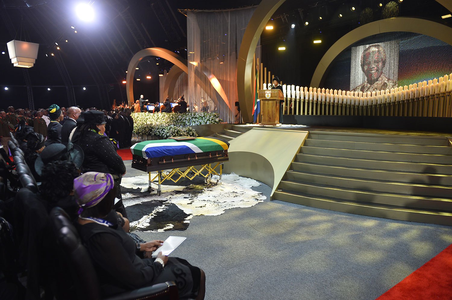 SAFRICA-MANDELA-FUNERAL - The coffin of South African former president Nelson Mandela is seen during his funeral ceremony in Qunu on December 15, 2013. Mandela, the revered icon of the anti-apartheid struggle in South Africa and one of the towering political figures of the 20th century, died in Johannesburg on December 5 at age 95.  AFP PHOTO / POOL / ODD ANDERSEN        (Photo credit should read ODD ANDERSEN/AFP/Getty Images)