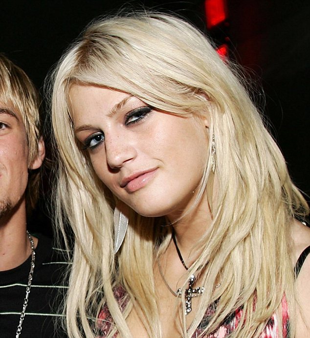 FILE - Nick And Aaron Carter's Sister Dead At 25 - HOLLYWOOD - FILE:  Musicians AJ McLean, Aaron Carter and Leslie Carter, pose at the Howie Dorough of the Backstreet Boys and Promoter Dave Ockun's Birthday Celebration party in aid of the Lupas Foundation at LAX nightclub, on August 16,2006 in Hollywood, California  (Photo by Frazer Harrison/Getty Images)