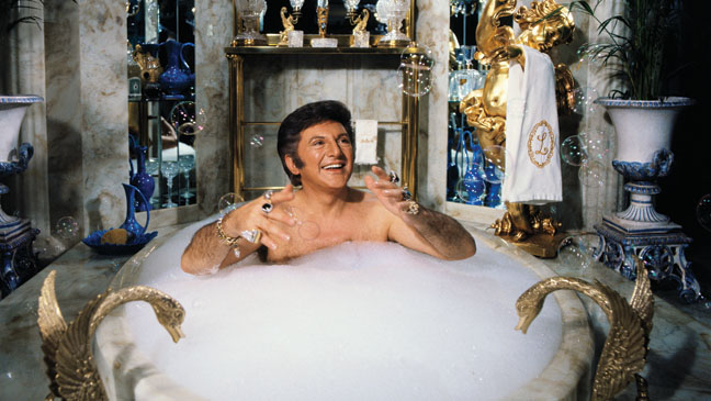 Liberace Taking a Bubble Bath - 28 Jan 1978, Los Angeles, California, USA --- Liberace spoofs a day in his own life during a television special, including a scene where he baths in his $55,000 marble bathtub. --- Image by © Bettmann/CORBIS